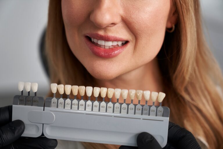 woman having cosmetic dentistry at dentist s office