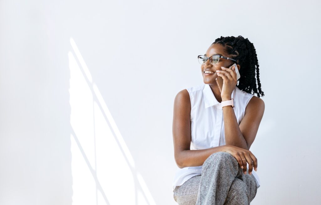 Smiling woman talking on the phone