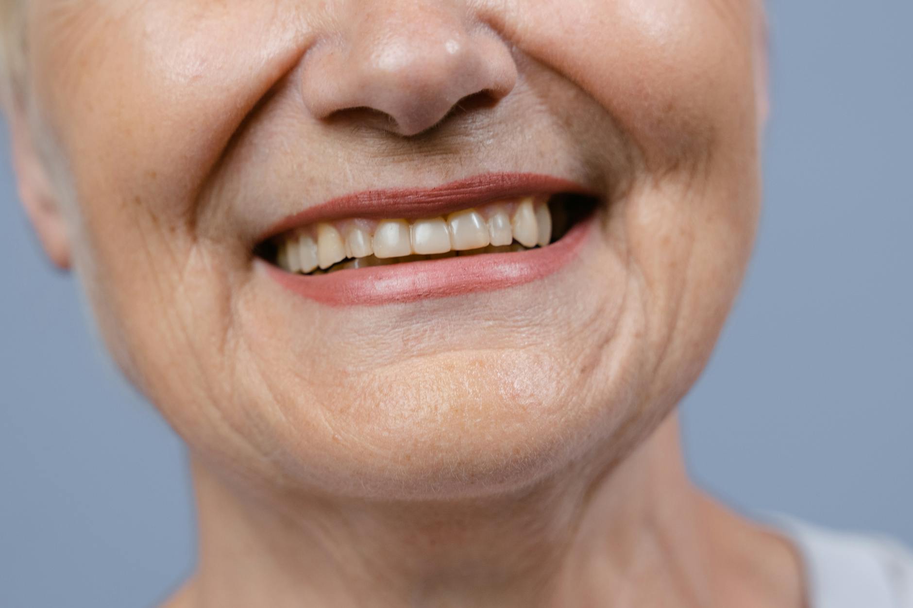 close up comparison of young teeth versus aged worn teeth