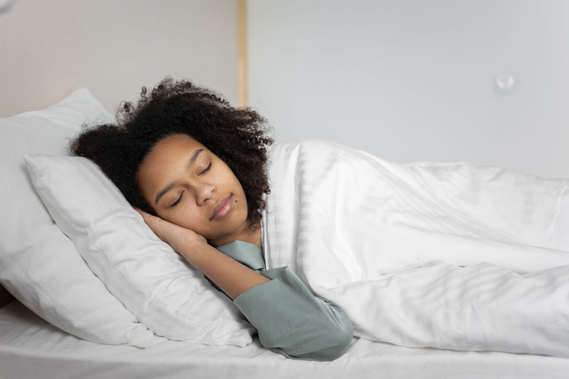 woman sleeping peacefully with night guard protection